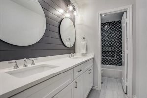 Remodeled bathroom with two sinks