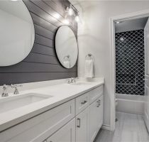 Remodeled bathroom with two sinks